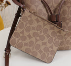 Signature Monogram Drawstring Bucket Bag | Crossbody & Shoulder Edition