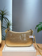 Embossed Monogram Curved Shoulder Bag – Elegant Crescent Underarm Bag
