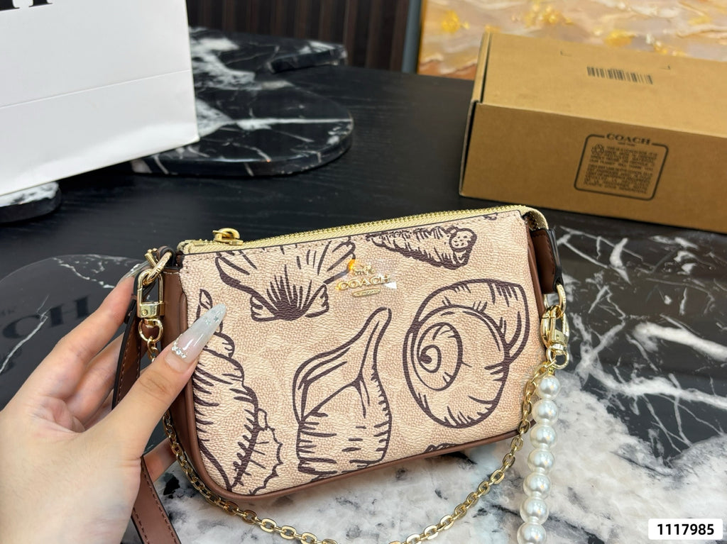 Seashell Monogram Pearl Chain Wristlet Pochette