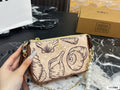 Seashell Monogram Pearl Chain Wristlet Pochette