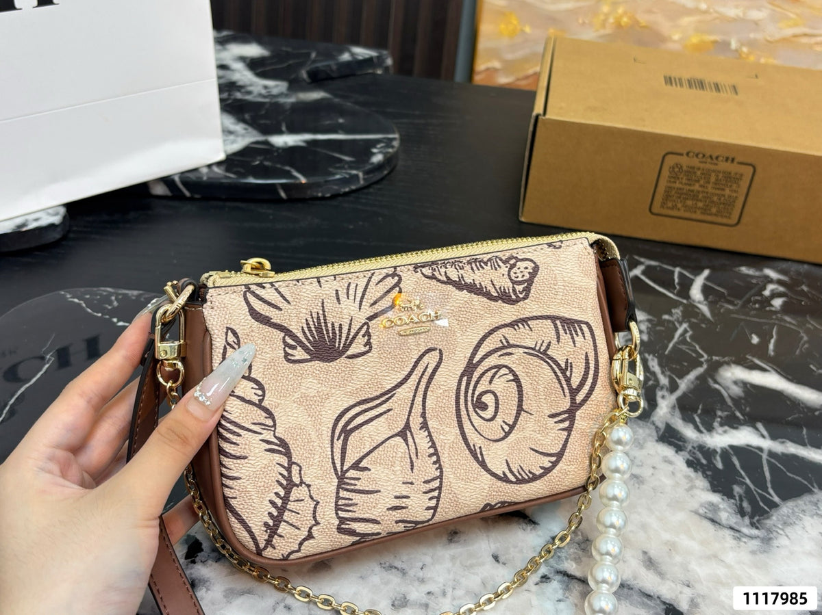 Seashell Monogram Pearl Chain Wristlet Pochette