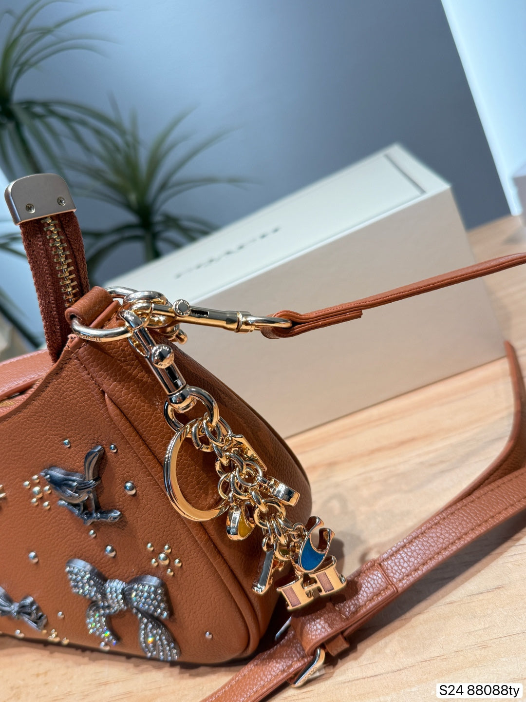 Teri Printed Leather Crescent Shoulder Bag & Crossbody
