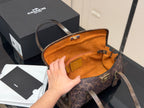 Monogram Canvas Barrel Shoulder Bag