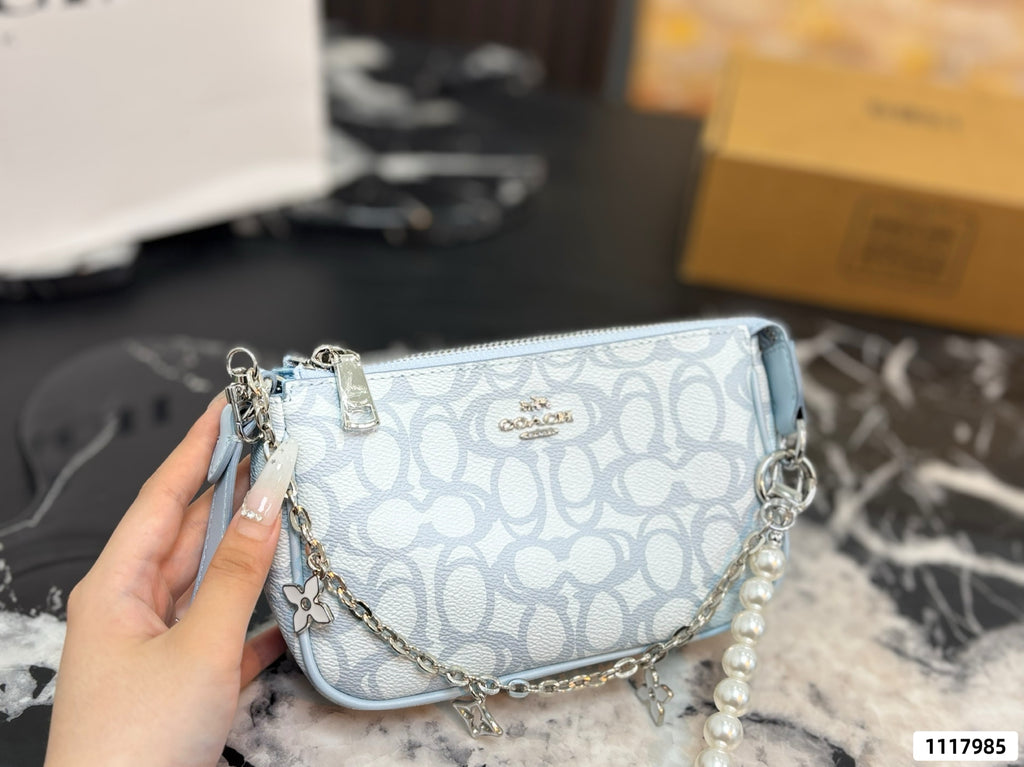 Seashell Monogram Pearl Chain Wristlet Pochette