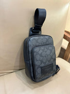 Signature Monogram Leather Sling Crossbody Bag