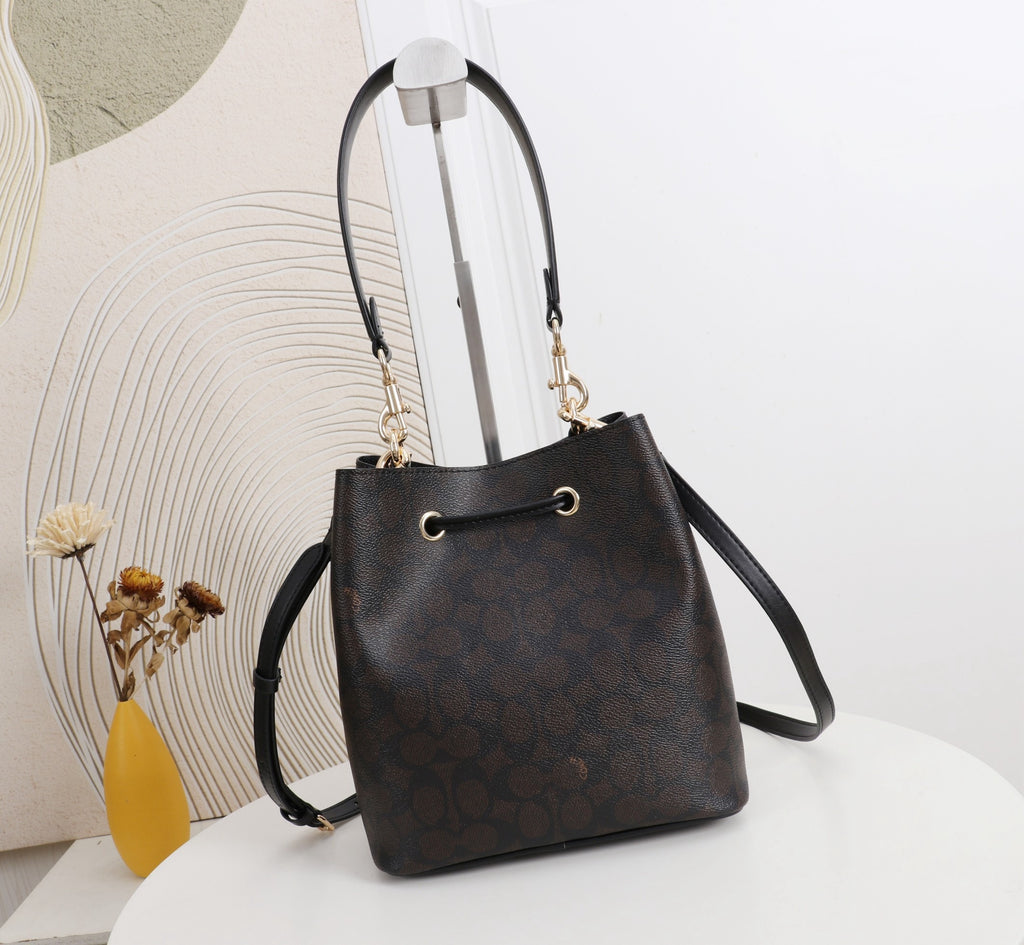 Signature Monogram Drawstring Bucket Bag | Crossbody & Shoulder Edition