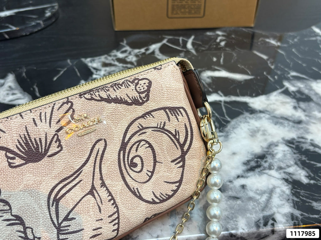 Seashell Monogram Pearl Chain Wristlet Pochette