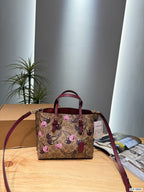 The Floral Printed Leather Bucket Tote & Crossbody