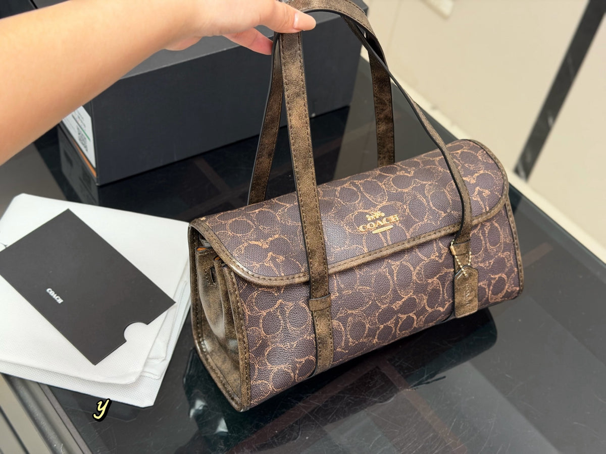 Monogram Canvas Barrel Shoulder Bag