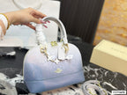 Classic Embossed Dome Satchel Bag