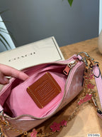 Embossed Monogram Curved Shoulder Bag – Elegant Canvas Crescent Bag