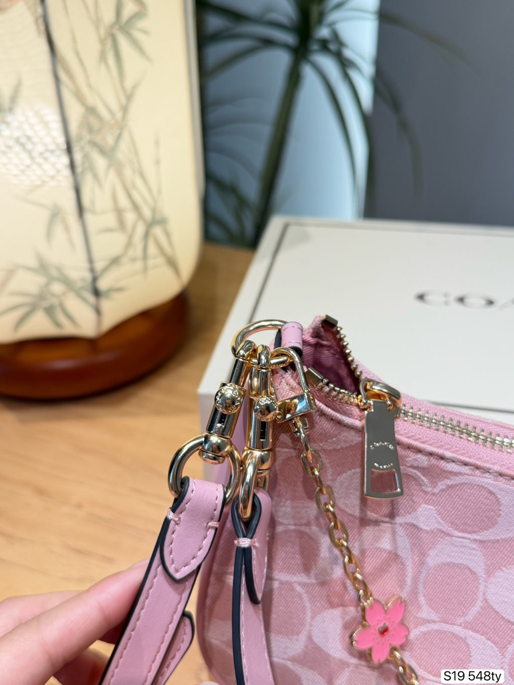 Embossed Monogram Curved Shoulder Bag – Elegant Canvas Crescent Bag