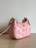 Pink Shoulder Bag with Gold Chain and Crossbody Strap
