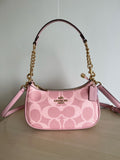 Pink Shoulder Bag with Gold Chain and Crossbody Strap