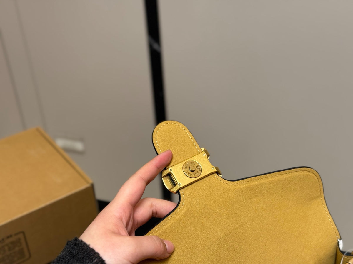 White Shoulder Bag with Gold-Tone Hardware and Adjustable Strap