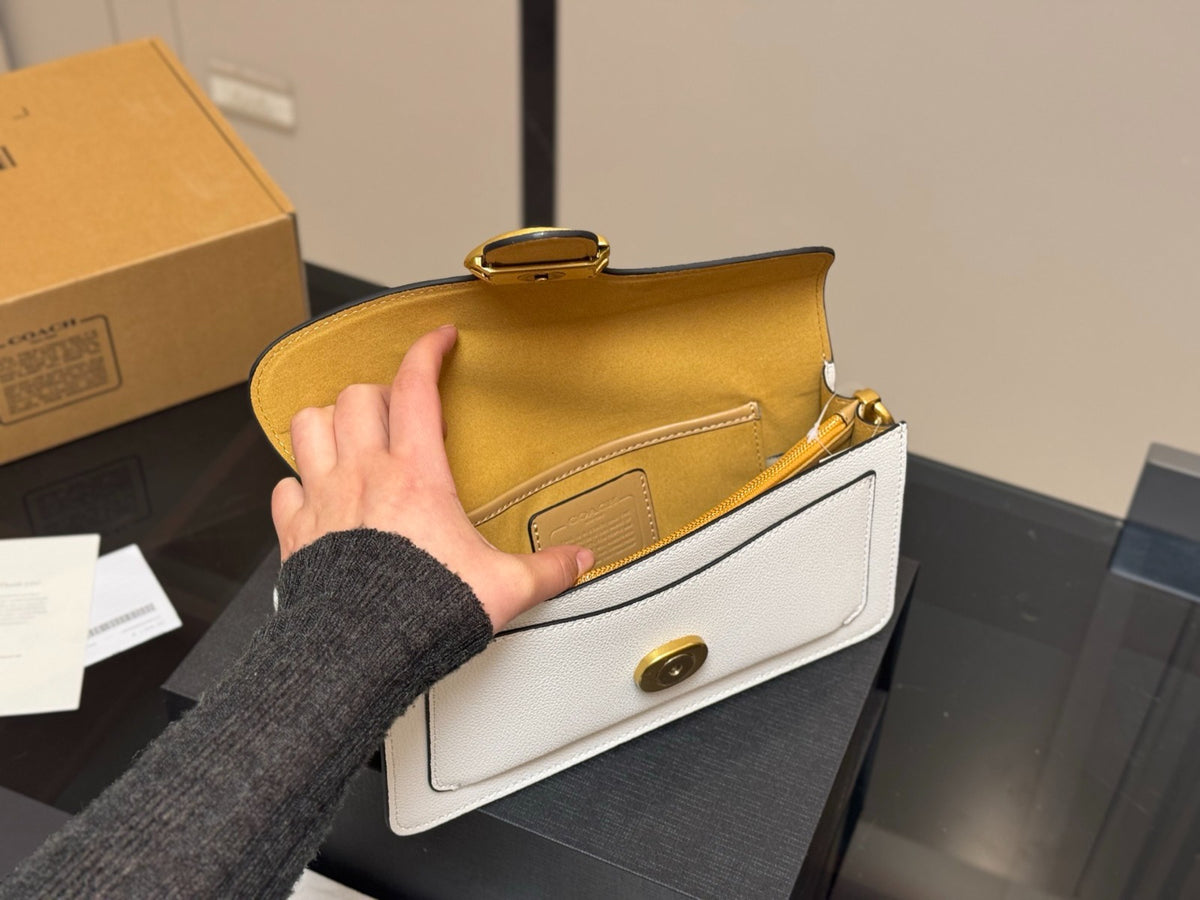White Shoulder Bag with Gold-Tone Hardware and Adjustable Strap