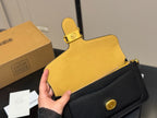Black Shoulder Bag with Gold-Tone Hardware and Adjustable Strap