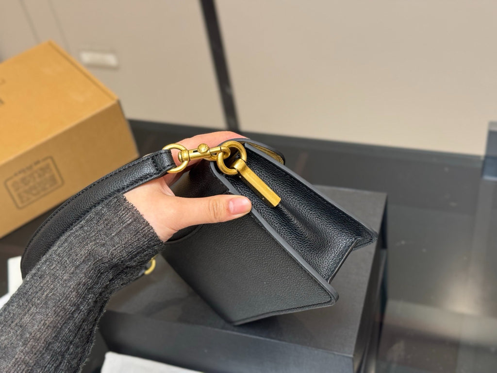Black Shoulder Bag with Gold-Tone Hardware and Adjustable Strap