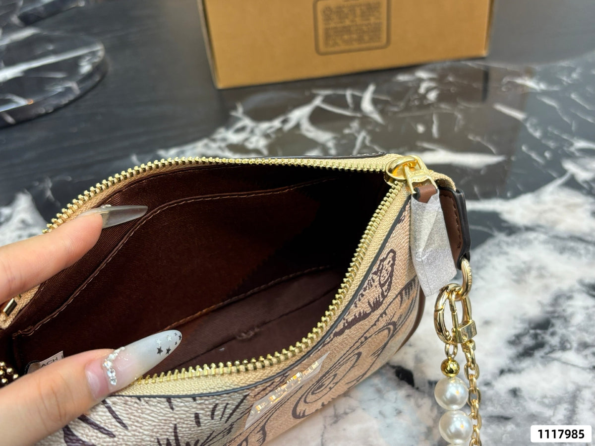 Seashell Monogram Pearl Chain Wristlet Pochette