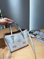 The Floral Printed Leather Bucket Tote & Crossbody