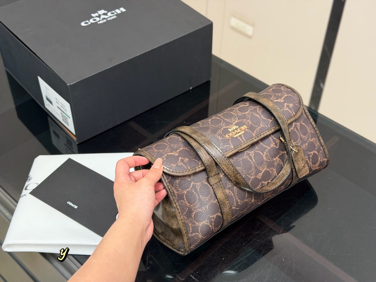 Monogram Canvas Barrel Shoulder Bag