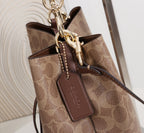 Signature Monogram Drawstring Bucket Bag | Crossbody & Shoulder Edition
