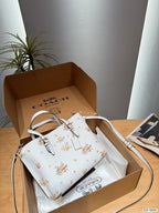The Floral Printed Leather Bucket Tote & Crossbody