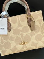 Women's Signature Canvas Maggie Small Tote bag